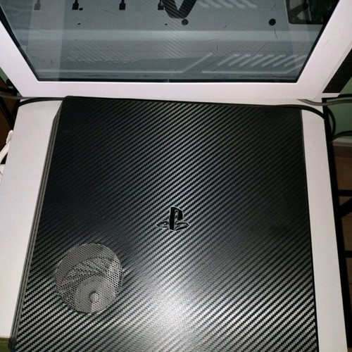 PlayStation 4 Pro like new with 500GB SSD and carbon skin