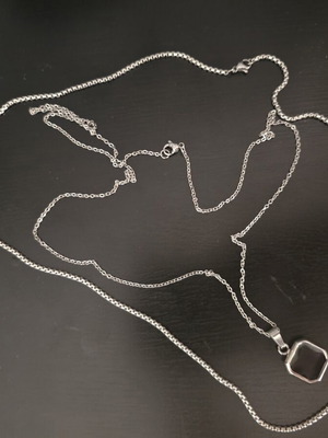 Silver necklace with geometric pendant and black stone, like new