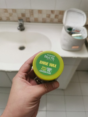 Fructis Shine Wax hair styling product nearly full