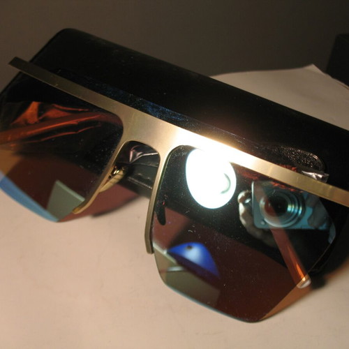 Stylish women's sunglasses with blue mirrored lenses, gold frame