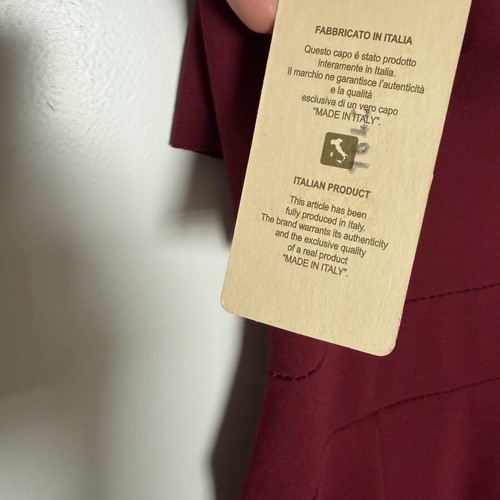 Burgundy jumpsuit with ruffles by Moda new, one size