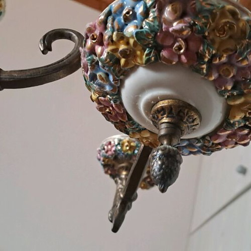 Vintage ceiling chandelier used with brass wall sconces and porcelain