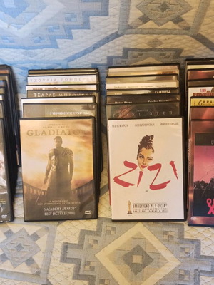 Collection of 153 DVDs and 20 music CDs like new