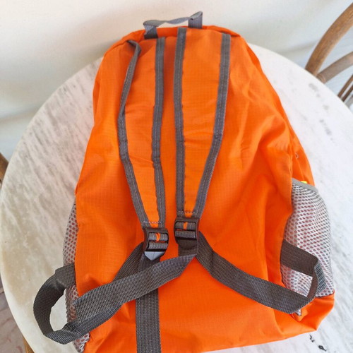 Orange backpack like new for holidays