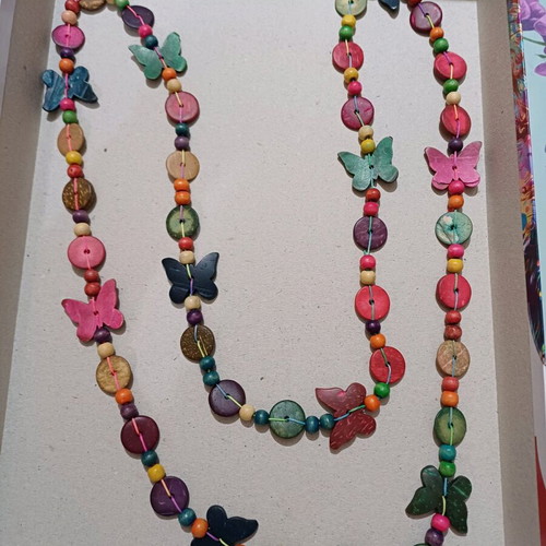 Wooden very long necklace with butterflies used