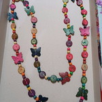 Wooden very long necklace with butterflies used