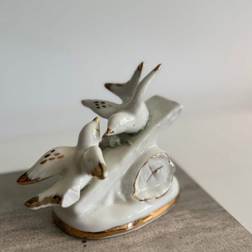Vintage porcelain figurine of two white doves with gold accents used