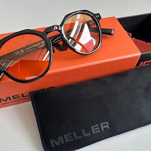Meller Sunglasses new, black frame with yellow lenses