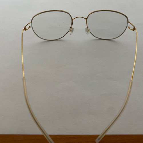 Glasses with ultralight titanium frame gold color, like new