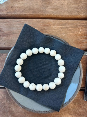 Bracelet with beads on elastic like new, white