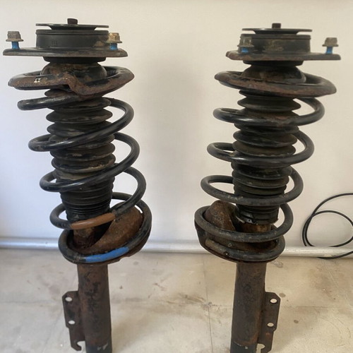 Ford Escort front shock absorbers complete with springs and mounts used