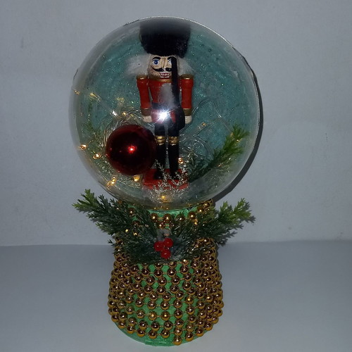 Handmade plexiglass decorative ball with Nutcracker and led lights