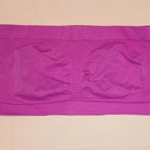 Women's latex bustier like new, pink strapless without padding