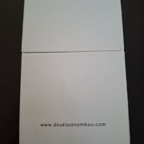 Doukissa Nomikou perfume box like new, empty