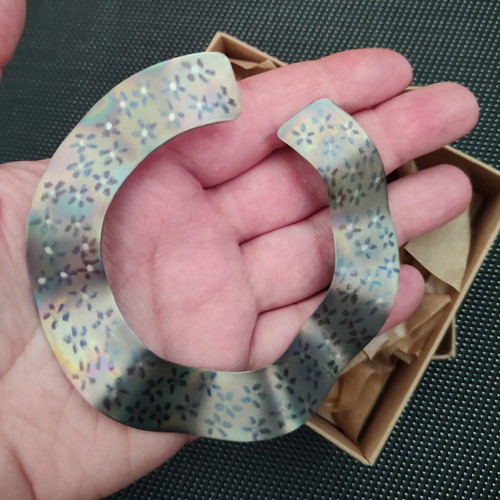 Titanium bracelet with iridescence and flowers like new
