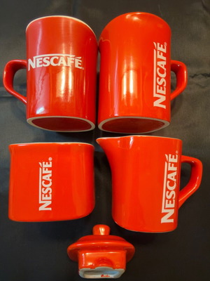 Nescafé ceramic collectible serving set like new, red