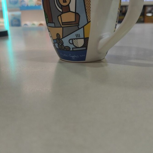 Coffee mug like new with colorful design
