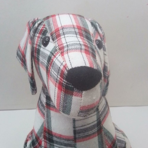 Fabric dog doorstop used