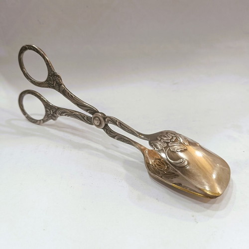 Sugar tongs used, Rococo Revival style, mid-20th century