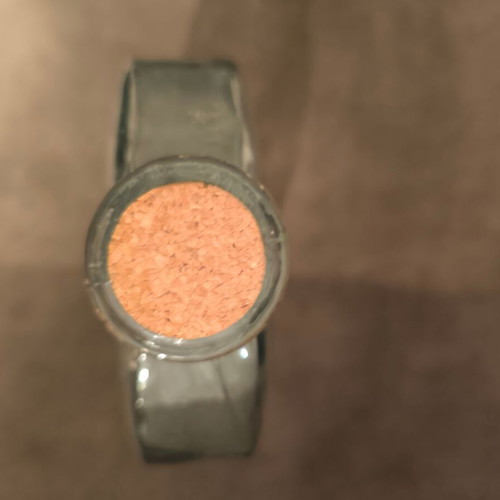 Bottle with cork made of recycled glass like new
