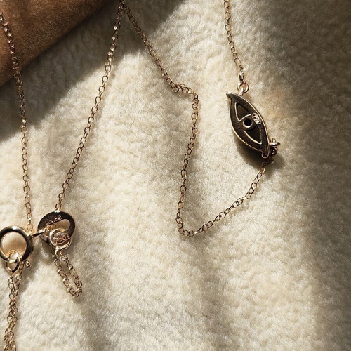 Rose gold evil eye 750 necklace with diamonds