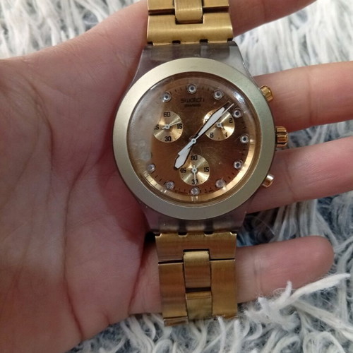 Swatch women's watch used, gold with dial imperfection