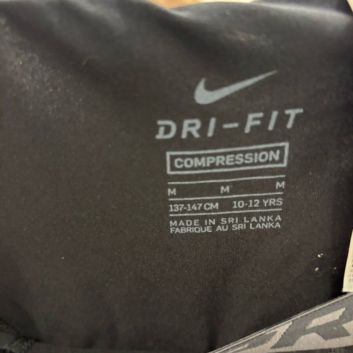 Nike thermal kids shorts size M black like new