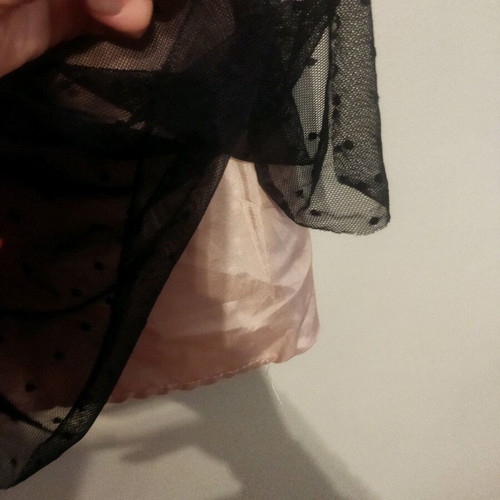 Skirt used with tulle on satin salmon base and black polka dots