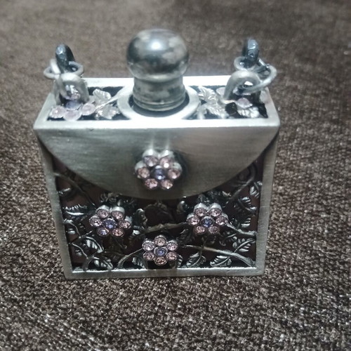 Vintage perfume bottle in Art Nouveau style, new