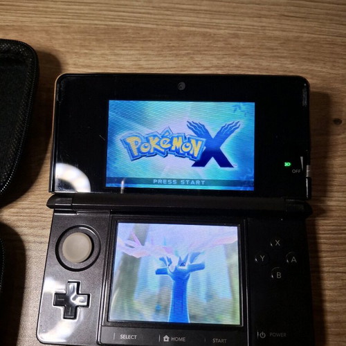 Nintendo 3DS Black used with new carrying case and USB charger