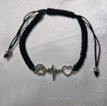 Handmade bracelet with scratch new, black and silver