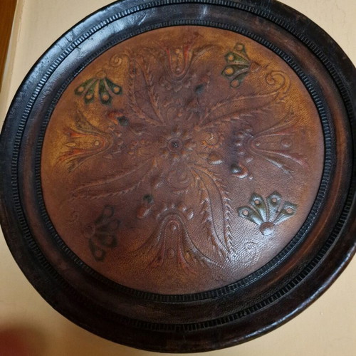 Vintage wooden wall decoration with leather center