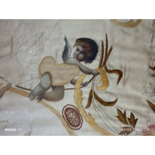 Embroidery with angels and flowers on silk or satin, used
