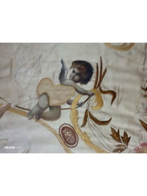 Embroidery with angels and flowers on silk or satin, used