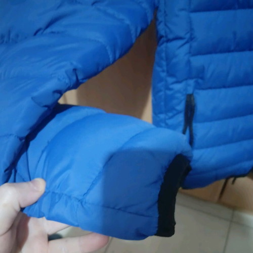 The North Face blue jacket like new, size M unisex