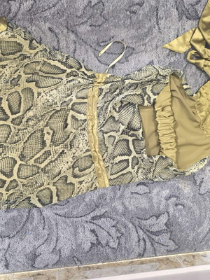 Short dress with detailed neckline