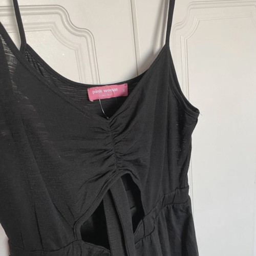 Pink Woman short romper with front opening like new, black
