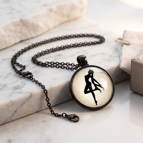 Handmade ballerina figure pendant necklace in steel and glass