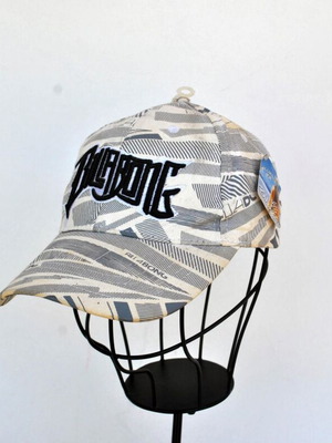 Billabong beige hat used with logo and graphic print