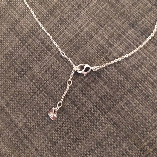 Swarovski necklace with purple stone like new