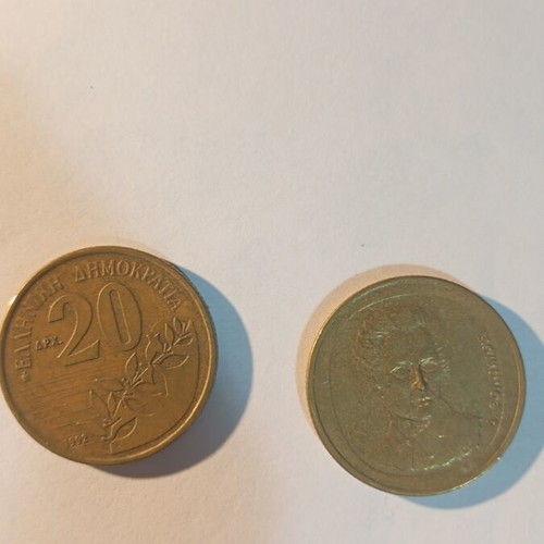 Twenty drachma coins used, two pieces 1990 and 1992