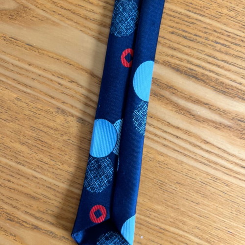 Vintage men's tie blue with geometric polka dots, retro style