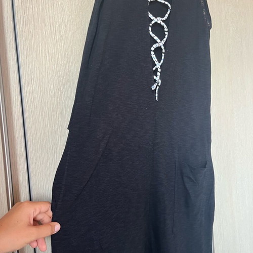 Small cotton salopette used with pockets
