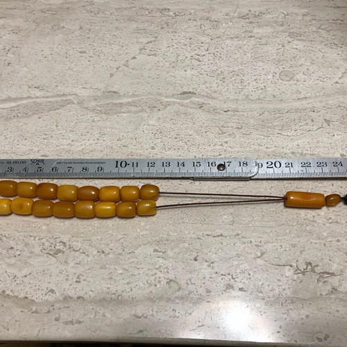 Worry beads used from royal amber with silver logo