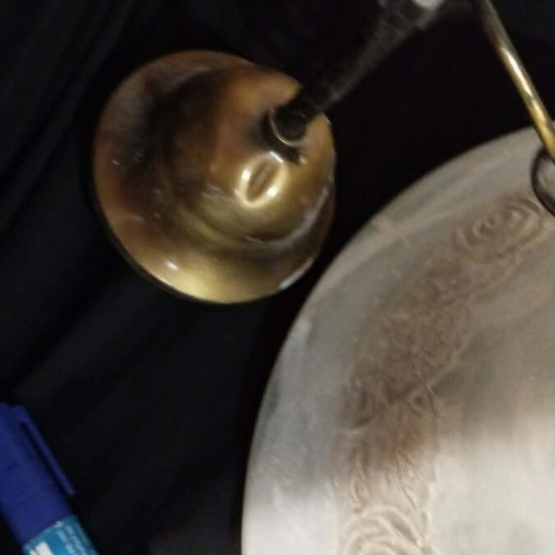 Glass ceiling light used with small bronze decorative chip