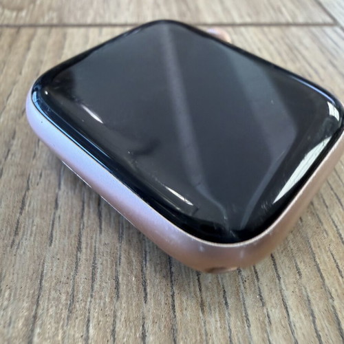 Apple Watch Series SE 44mm used, rose gold with new white strap
