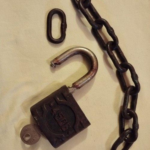 Padlock used with key, chain and skeleton key