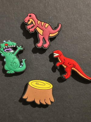 Dinosaurs Crocs Charms set like new, red and multicolor