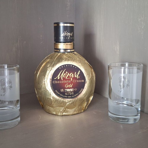 Mozart chocolate cream gold bottle with two promotional glasses used