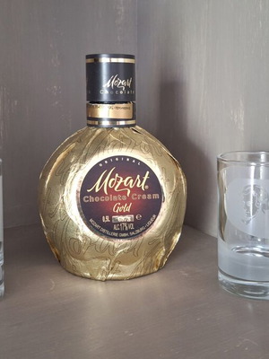 Mozart chocolate cream gold bottle with two promotional glasses used